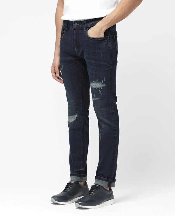 Rare Rabbit Men's Erie Dusky Blue Slim Fit Mid Rise Mid Wash With Mild Whisker Distress Jeans
