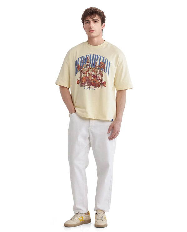 Rare Rabbit Men Fler Pastel Yellow Cotton Fabric Short Sleeve Crew Neck Oversized Fit Hd and Typography Print T-Shirt