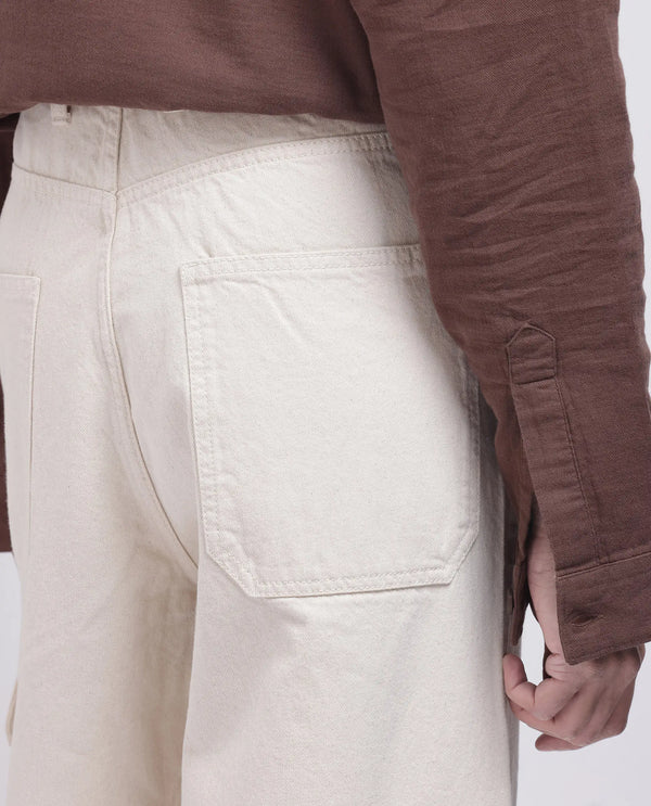 Rare Rabbit Men's Freks Beige Cotton Fabric Button And Zip Closure Baggy Fit Plain Jeans