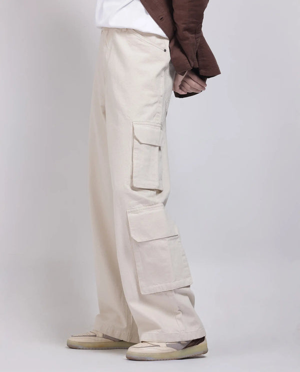 Rare Rabbit Men's Freks Beige Cotton Fabric Button And Zip Closure Baggy Fit Plain Jeans