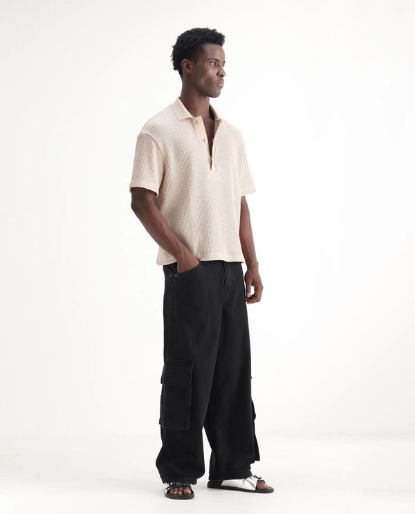 Rare Rabbit Men's Freks Black Cotton Fabric Button And Zip Closure Baggy Fit Plain Jeans