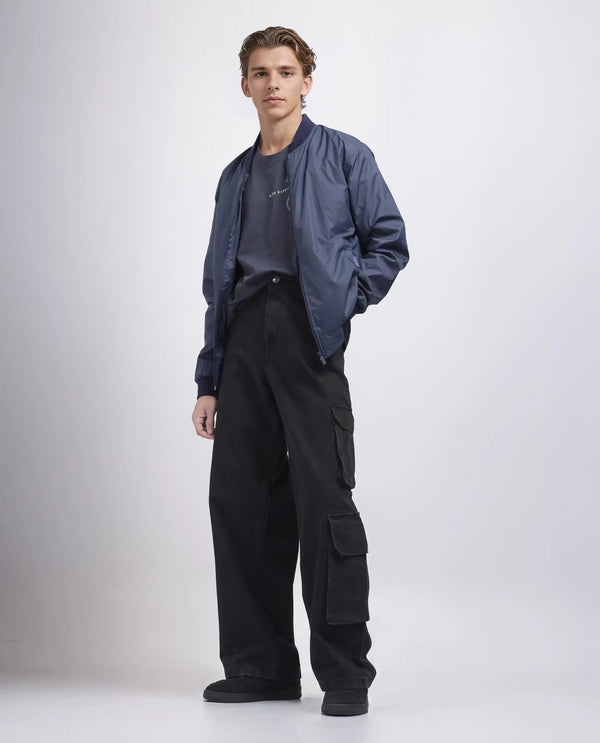Rare Rabbit Men's Freks Black Cotton Fabric Button And Zip Closure Baggy Fit Plain Jeans