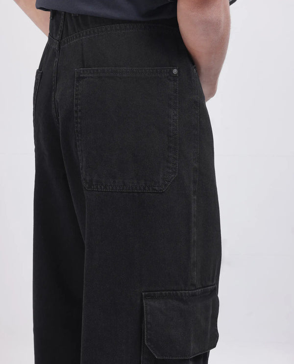 Rare Rabbit Men's Freks Black Cotton Fabric Button And Zip Closure Baggy Fit Plain Jeans