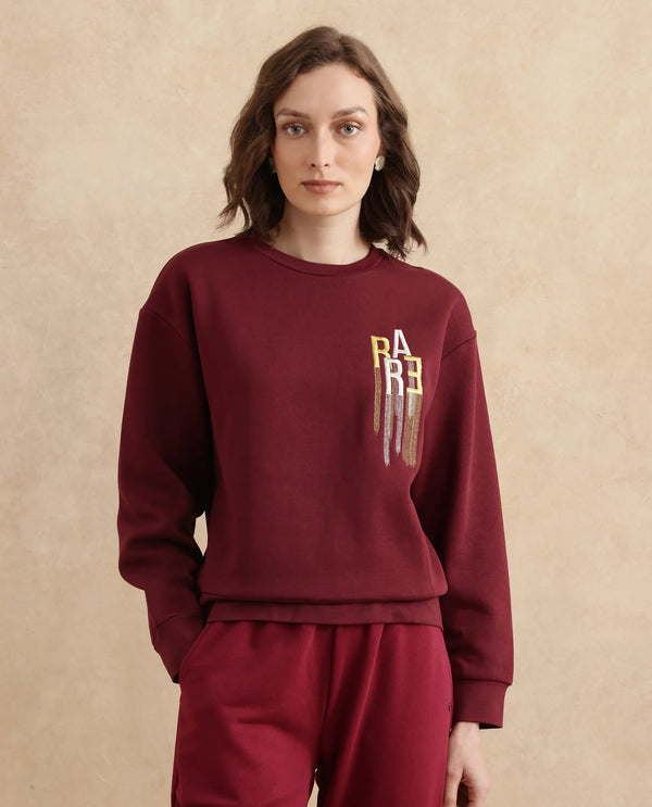 Rareism Women Geldia Maroon Cotton Blend Fabric Full Sleeve Crew Neck Relaxed Fit Graphic Print Sweatshirt
