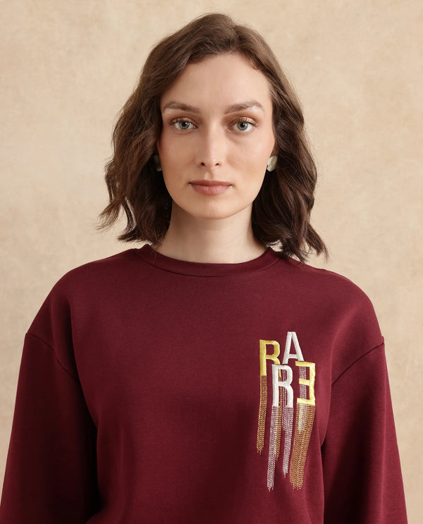 Rareism Women Geldia Maroon Cotton Blend Fabric Full Sleeve Crew Neck Relaxed Fit Graphic Print Sweatshirt