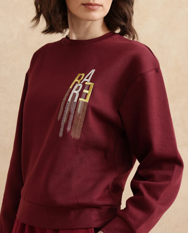 Rareism Women Geldia Maroon Cotton Blend Fabric Full Sleeve Crew Neck Relaxed Fit Graphic Print Sweatshirt