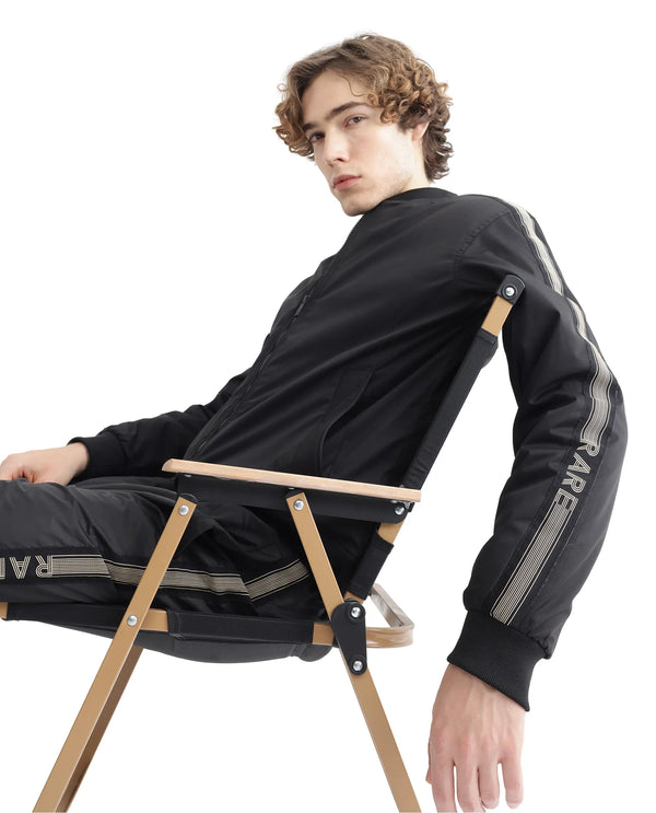 Rare Rabbit Men Ghana Black Polyester Fabric Full Sleeve Ribbed Collar and Cuff Zipper Closure Tape Detailed Plain Jacket