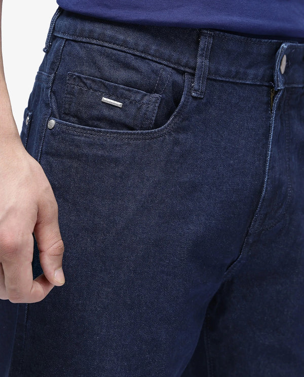 Rare Rabbit Men Gleb Dark Blue Cotton Fabric Mid Rise Carrot Fit Mid Wash Plain Denim Trousers