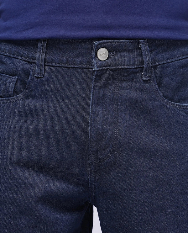 Rare Rabbit Men Gleb Dark Blue Cotton Fabric Mid Rise Carrot Fit Mid Wash Plain Denim Trousers