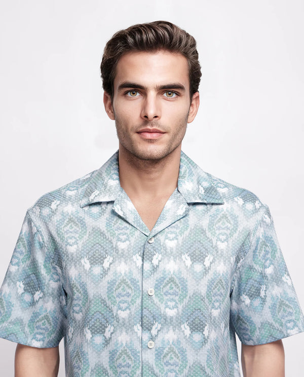 Rare Rabbit Men's Grit Blue Cotton Fabric Short Sleeve Cuban Neck Button Closure Abstract Shirt