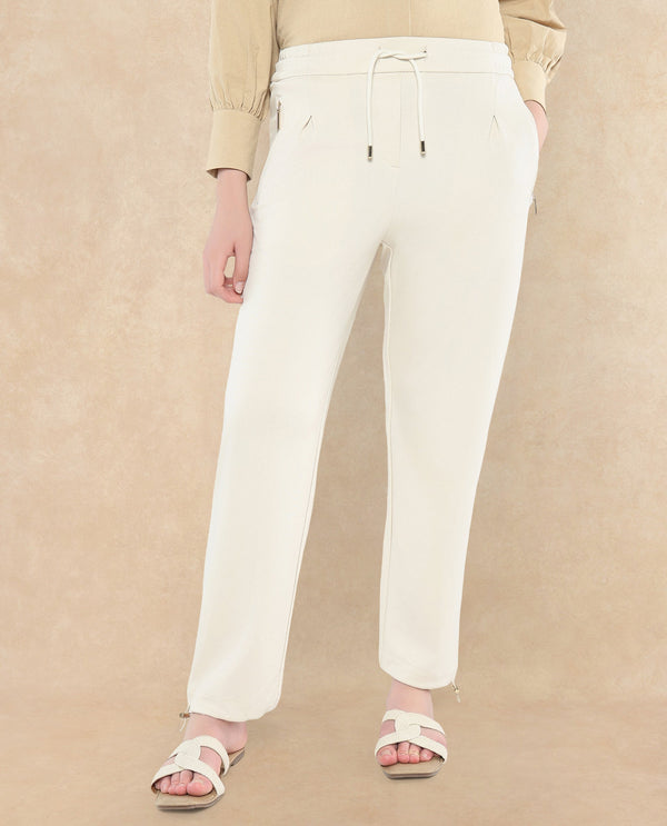 Rareism Women Gumushane Off White Modal Lycra Fabric Straight Fit Ankle Length Plain Track Pant