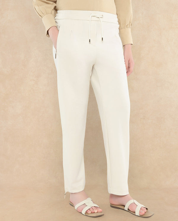 Rareism Women Gumushane Off White Modal Lycra Fabric Straight Fit Ankle Length Plain Track Pant