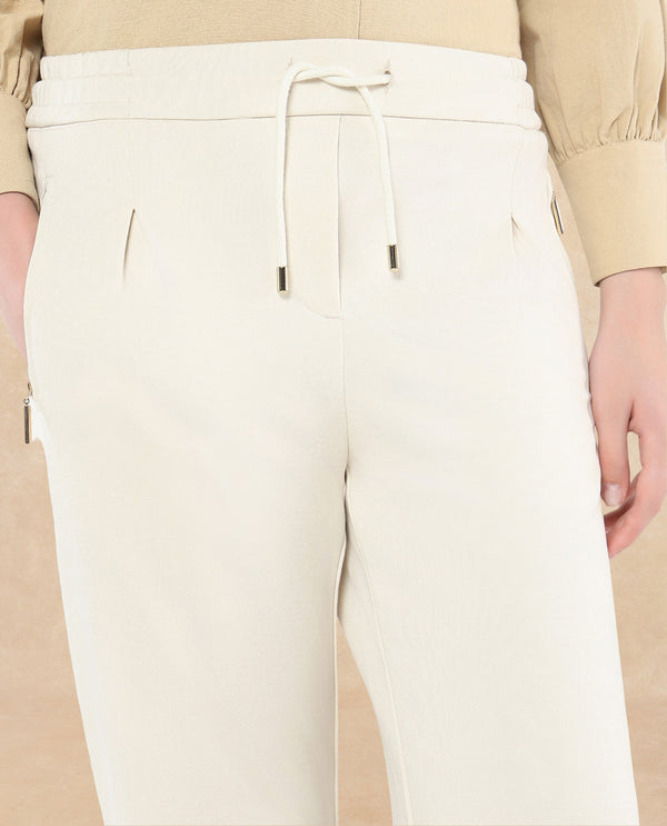 Rareism Women Gumushane Off White Modal Lycra Fabric Straight Fit Ankle Length Plain Track Pant