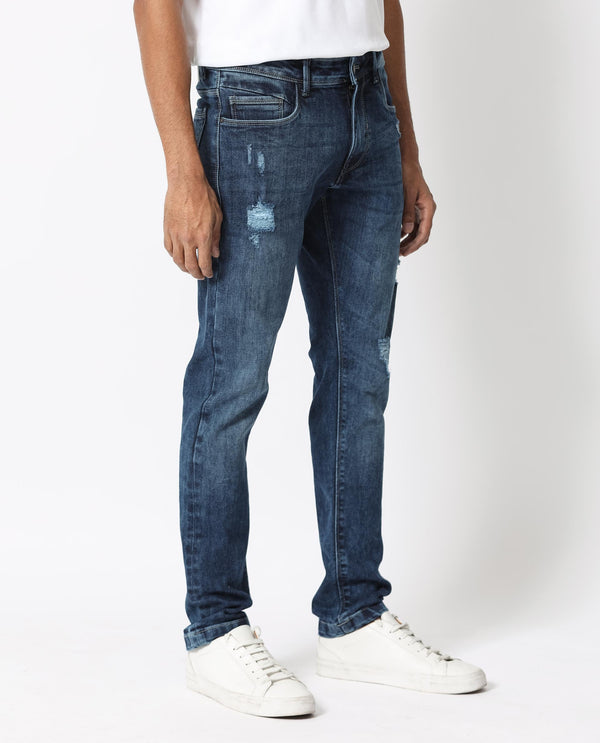 Rare Rabbit Men's Hawkins Light Blue Mid Wash Mid-Rise Distressed Slim Fit Jeans