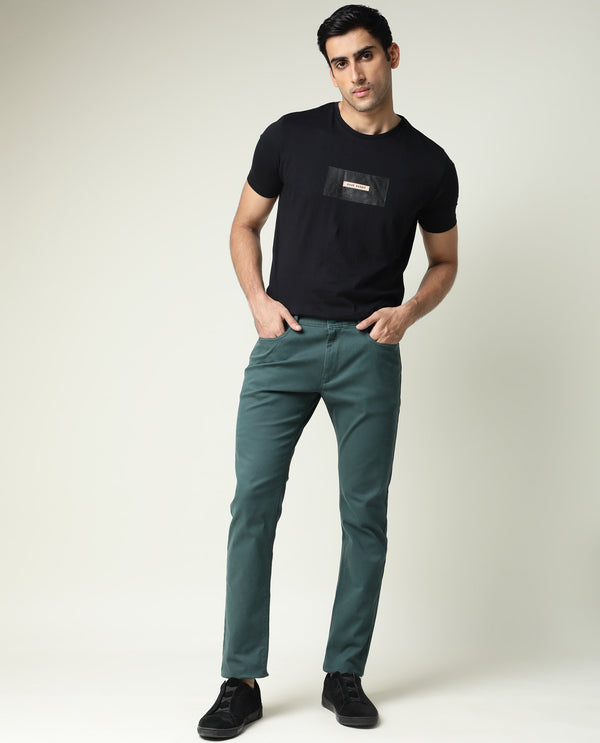 Rare Rabbit Men's Spoke-22 Green Solid Mid-Rise Regular Fit Stretch Trouser