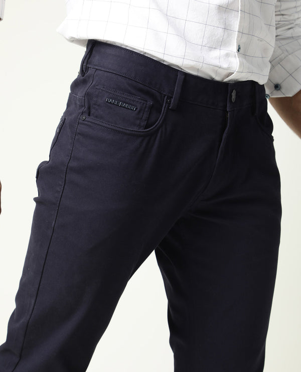 Rare Rabbit Men's Spoke-22 Navy Solid Mid-Rise Regular Fit Stretch Trouser