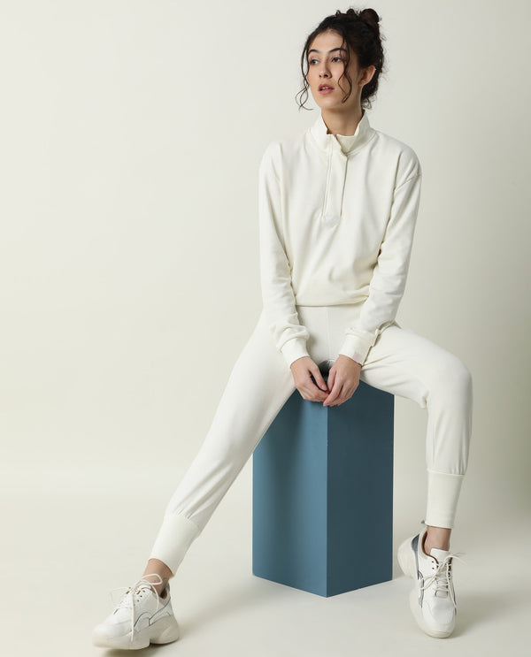 Rareism Women Simp-1 Off White Poly Cotton Fabric Tailored Fit Solid Mid Rise Ankle Length Track Pant