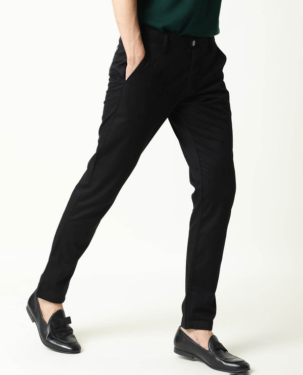 Rare Rabbit Men's Raptors Black Solid Mid-Rise Regular Fit Stretch Trouser