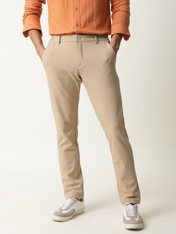 Rare Rabbit Men's Travel-1 Beige Solid Mid-Rise 4-Way Stretch Slim Fit Trouser