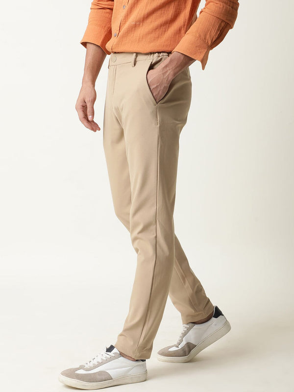 Rare Rabbit Men's Travel-1 Beige Solid Mid-Rise 4-Way Stretch Slim Fit Trouser