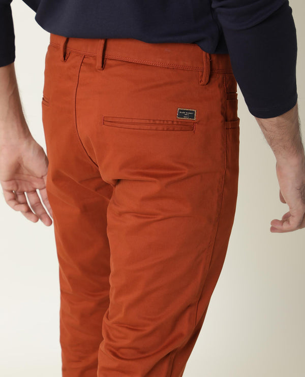 Rare Rabbit Men's Mark Dark Maroon Solid Mid-Rise Regular Fit Stretch Trouser