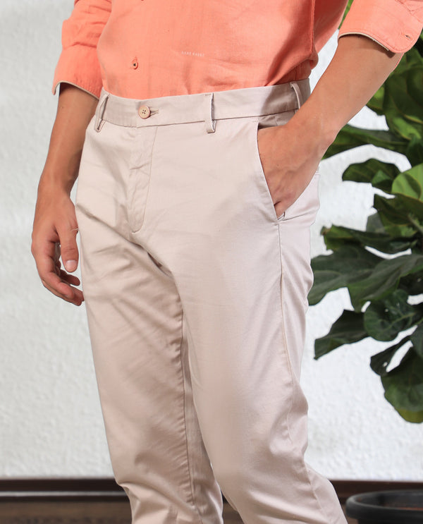 Rare Rabbit Men's Shines Pink Solid Mid-Rise Regular Fit Stretch Trousers