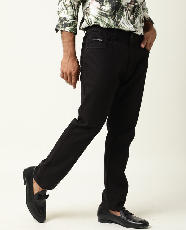 Rare Rabbit Men's Spoke-22 Black Solid Mid-Rise Regular Fit Trouser