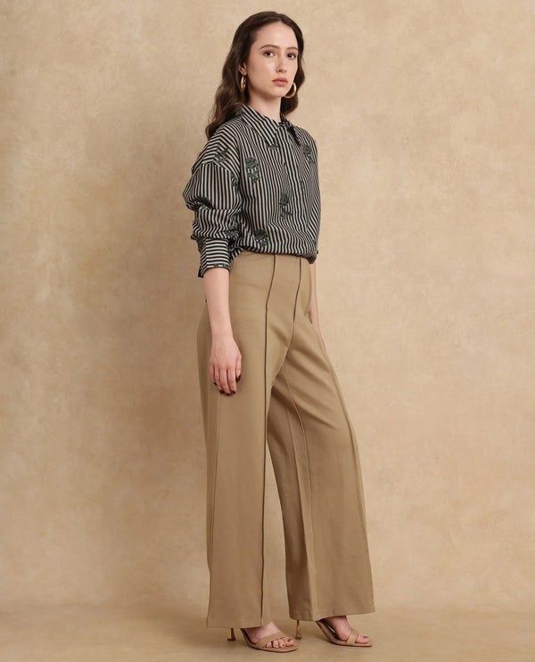 Rareism Women Jancura Beige Rayon Blend Fabric Round Neck Bootcut Ankle Length Plain Trouser