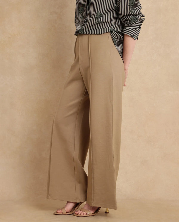 Rareism Women Jancura Beige Rayon Blend Fabric Round Neck Bootcut Ankle Length Plain Trouser