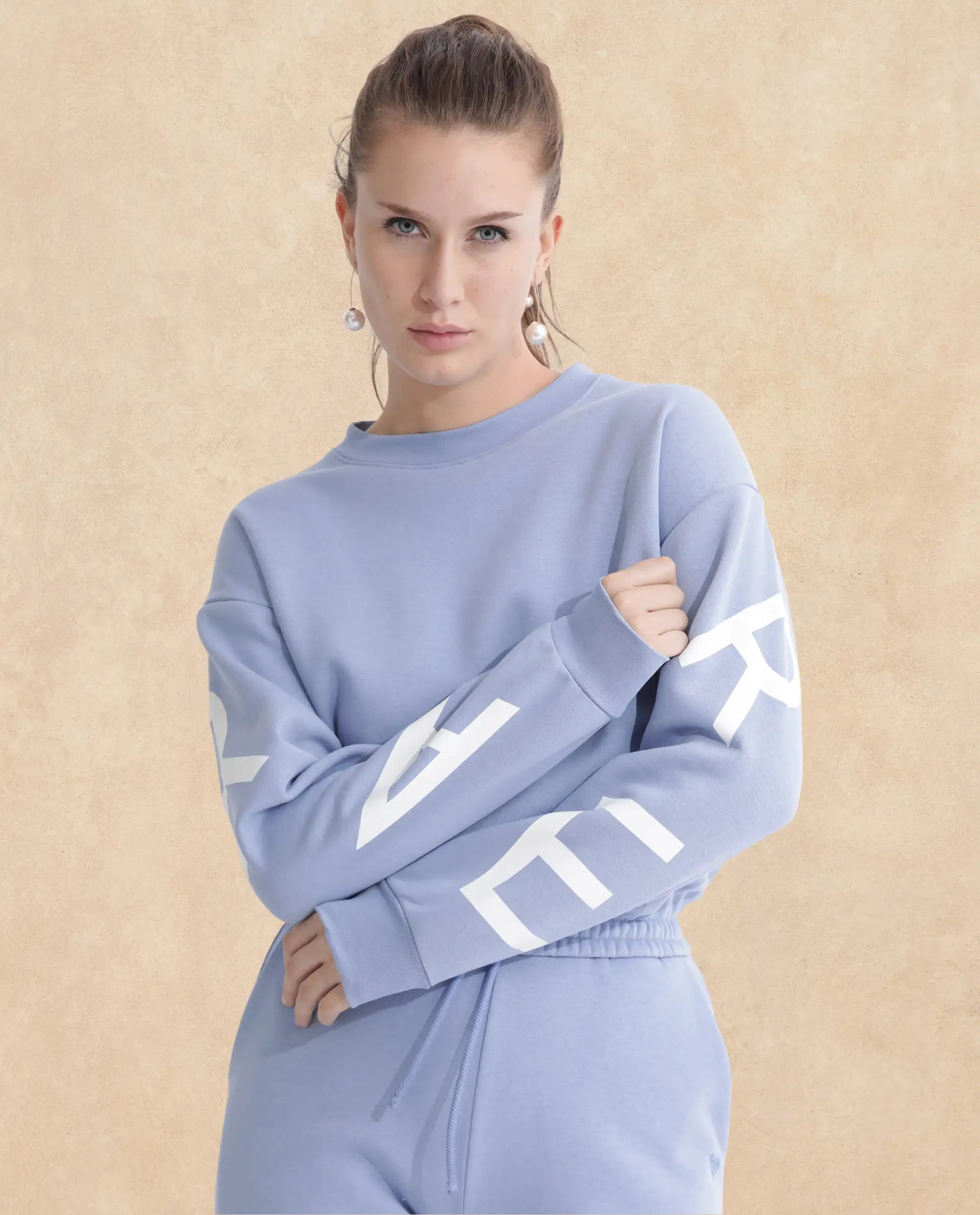 Rareism Articale Women Jonice Light Blue Poly Cotton Fabric Full Sleeves Crew Neck Regular Fit Graphic Print Cropped Sweatshirt