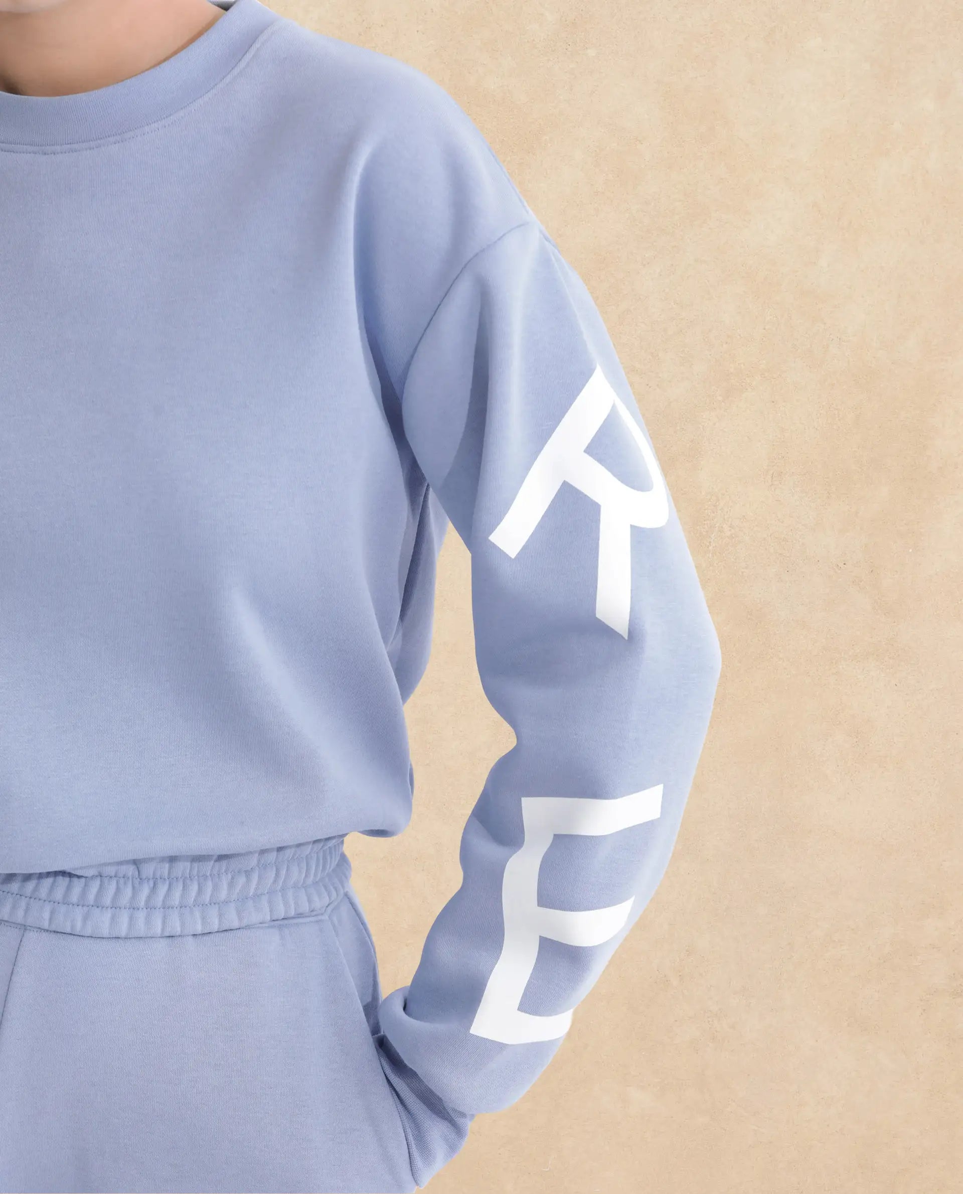 Rareism Articale Women Jonice Light Blue Poly Cotton Fabric Full Sleeves Crew Neck Regular Fit Graphic Print Cropped Sweatshirt