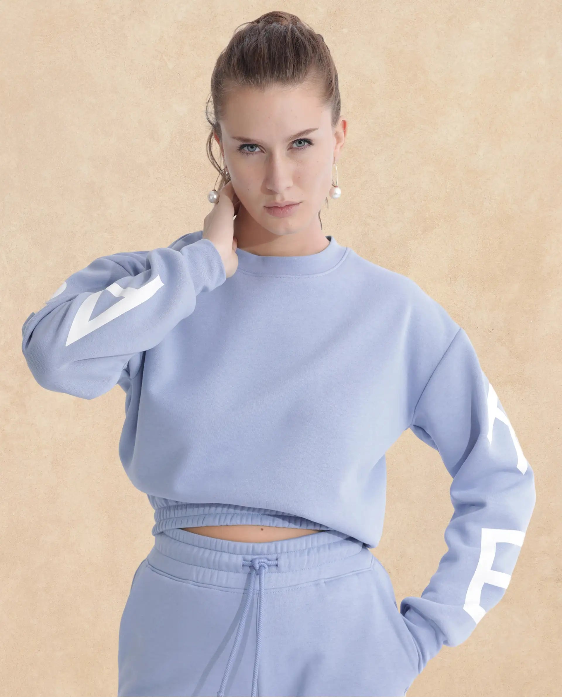 Rareism Articale Women Jonice Light Blue Poly Cotton Fabric Full Sleeves Crew Neck Regular Fit Graphic Print Cropped Sweatshirt