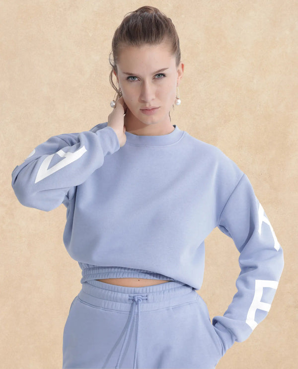 Rareism Articale Women Jonice Light Blue Poly Cotton Fabric Full Sleeves Crew Neck Regular Fit Graphic Print Cropped Sweatshirt