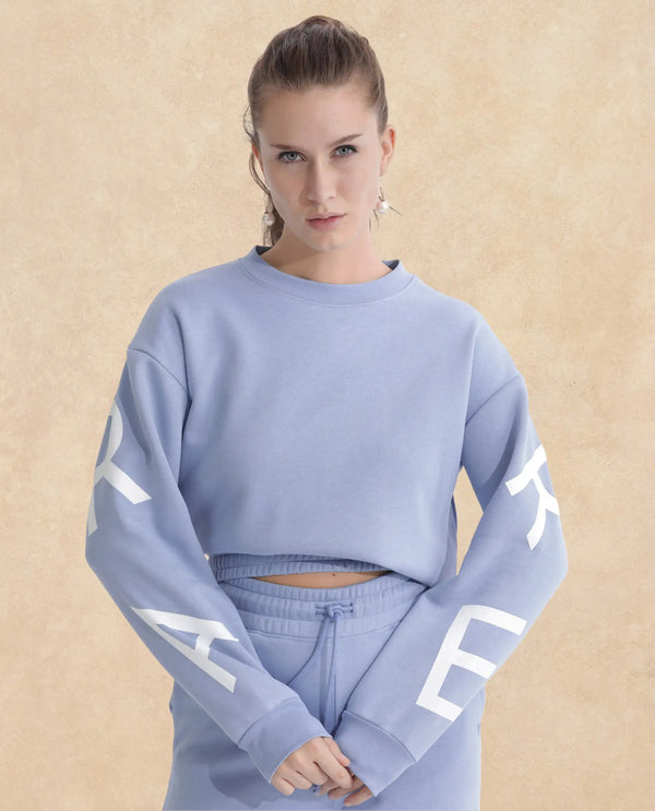 Rareism Articale Women Jonice Light Blue Poly Cotton Fabric Full Sleeves Crew Neck Regular Fit Graphic Print Cropped Sweatshirt