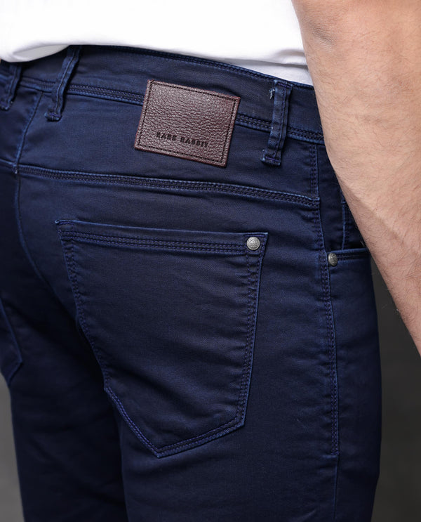Rare Rabbit Mens Jules Blue Mid Rise Mid Wash Cotton Polyester Solid Slim Fit Jeans