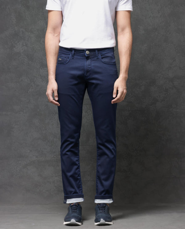 Rare Rabbit Mens Jules Blue Mid Rise Mid Wash Cotton Polyester Solid Slim Fit Jeans