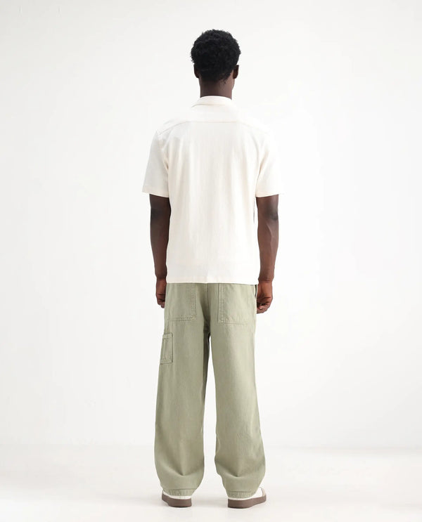 Rare Rabbit Men Klop Pastel Green Cotton Fabric Mid Rise Carpenter Fit Garment Dyed Plain Jeans