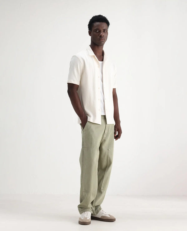 Rare Rabbit Men Klop Pastel Green Cotton Fabric Mid Rise Carpenter Fit Garment Dyed Plain Jeans