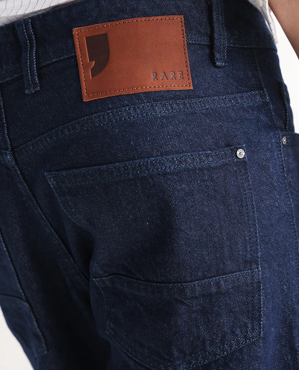 Rare Rabbit Men's Kobetor Dark Blue Cotton Fabric Rinse Wash Mid Rise Cut and Sew Solid Jeans