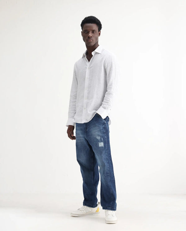 Rare Rabbit Men's Korb Blue Cotton Blend Fabric Shank And Zip Closure Skater Fit Plain Jeans