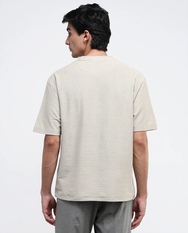 Rare Rabbit Men's Loopet Beige Cotton Lycra Fabric Half Sleeves Floral Print Pocket Detailing Oversized Fit Solid T-Shirt