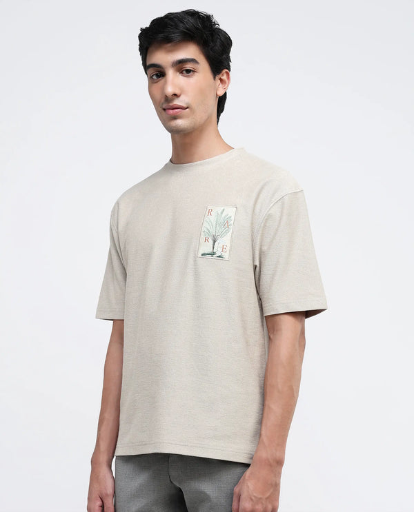 Rare Rabbit Men's Loopet Beige Cotton Lycra Fabric Half Sleeves Floral Print Pocket Detailing Oversized Fit Solid T-Shirt