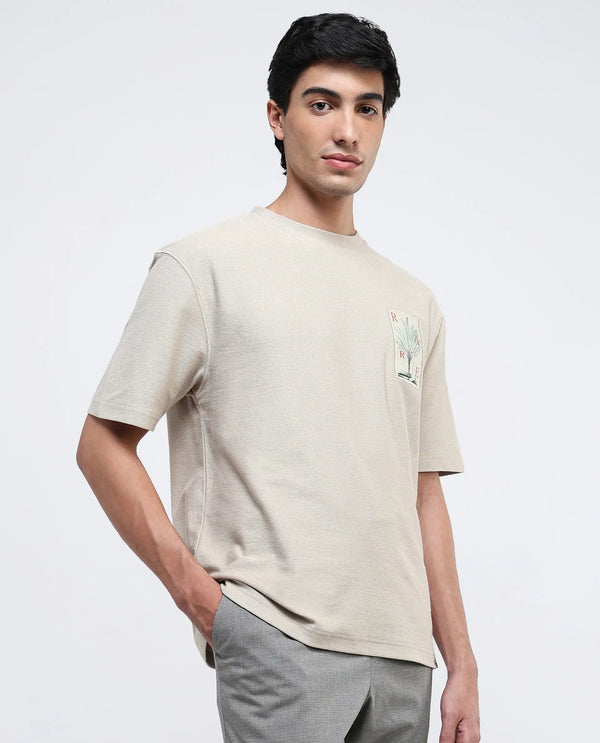 Rare Rabbit Men's Loopet Beige Cotton Lycra Fabric Half Sleeves Floral Print Pocket Detailing Oversized Fit Solid T-Shirt