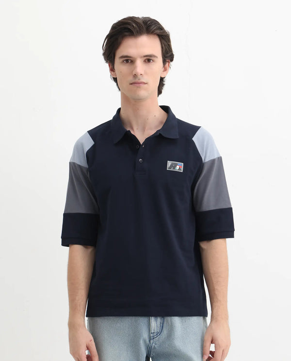 Rare Rabbit Men Lucid Navy Cotton Lycra Short Sleeve Collared Neck Button Closure Cut and Sew Polo