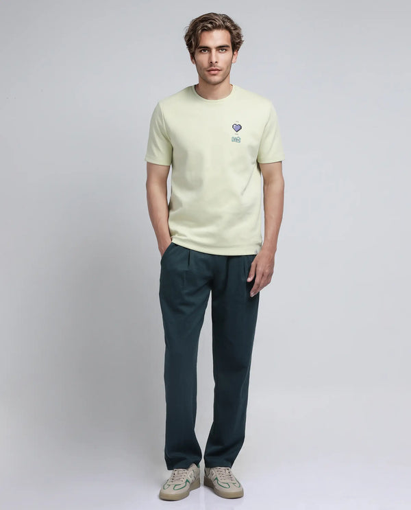 Rare Rabbit Men Luxa Pastel Yellow Cotton Blend Fabric Short Sleeve Crew Neck HD Print Pocket Placement T-Shirt
