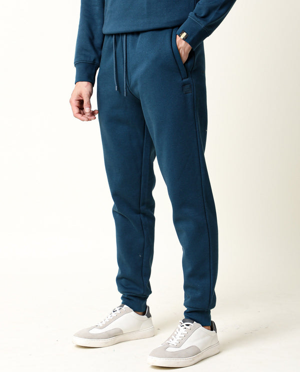 Rare Rabbit Men's Chase Petrol Cotton Polyester Fabric Relaxed Fit Mid Rise Track Pant