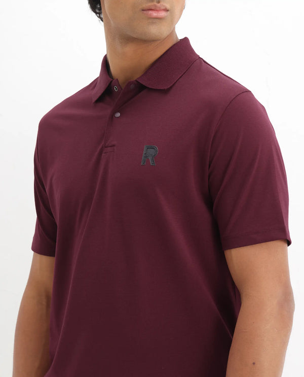 Rare Rabbit Men Merko Maroon Cotton Blend Fabric Short Sleeve Collared Neck Snap Button Closure Leather Badge Detail Plain Polo T-Shirt