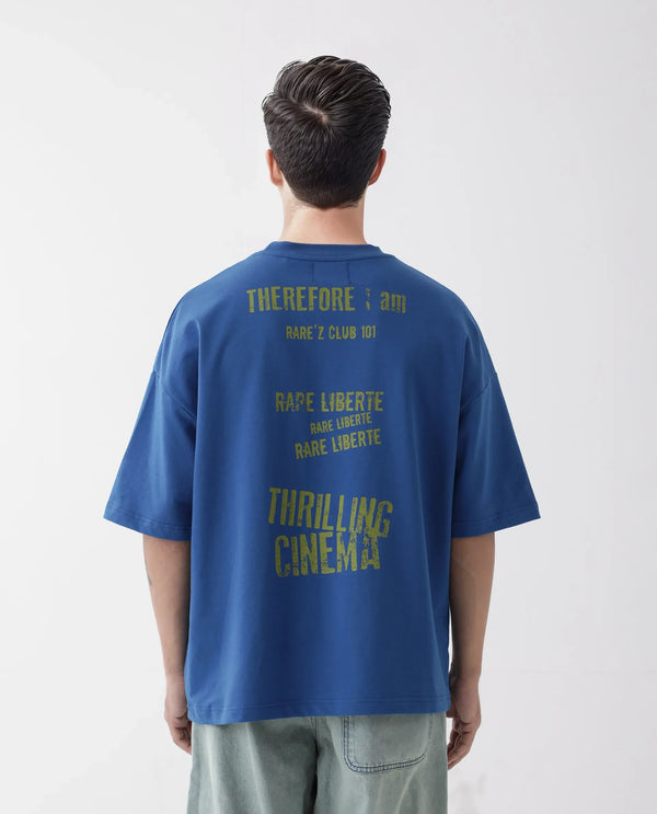 Rare Rabbit Men Moshe Flouroscent Blue Cotton Fabric Short Sleeve Oversized Fit Graphic Printed T-Shirt