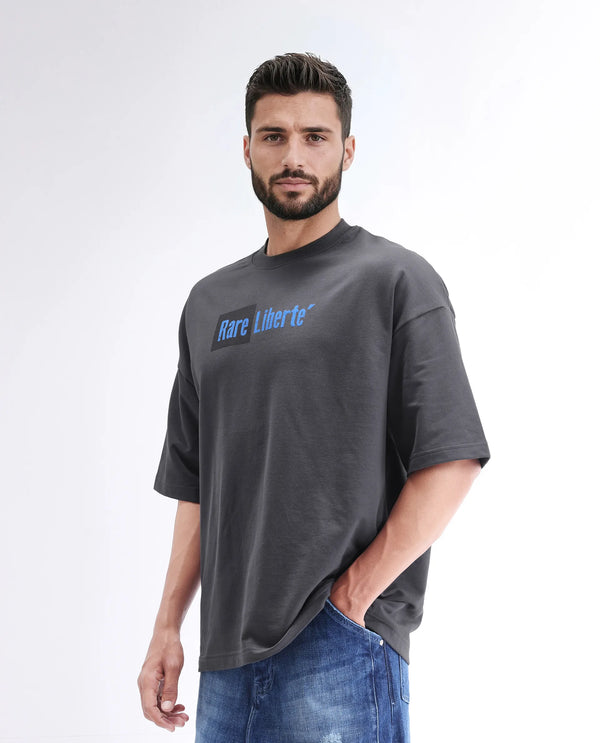 Rare Rabbit Men Moshe Grey Cotton Fabric Short Sleeve Oversized Fit Graphic Printed T-Shirt