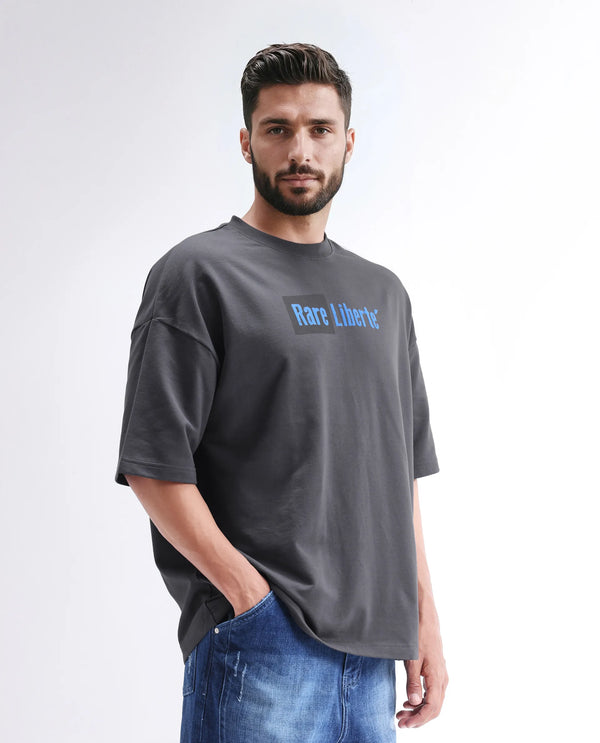 Rare Rabbit Men Moshe Grey Cotton Fabric Short Sleeve Oversized Fit Graphic Printed T-Shirt